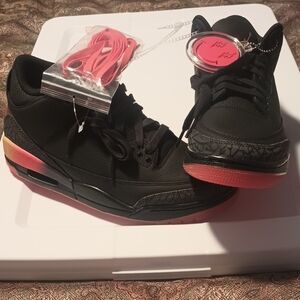 Black and Red Sneakers with Accessories